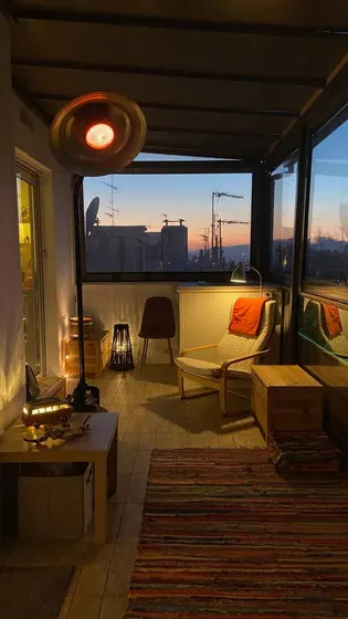 Terrace lounge with an Athens sunset view