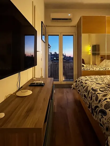 Bedroom, television, and terrace doors