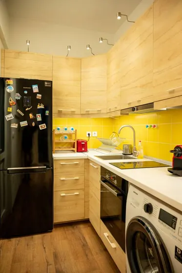 Fully equipped kitchen with washer and cooking appliances