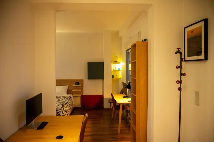 Work desk, dining area, and apartment entrance