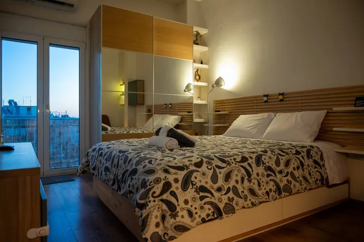 Double bed beside the terrace doors