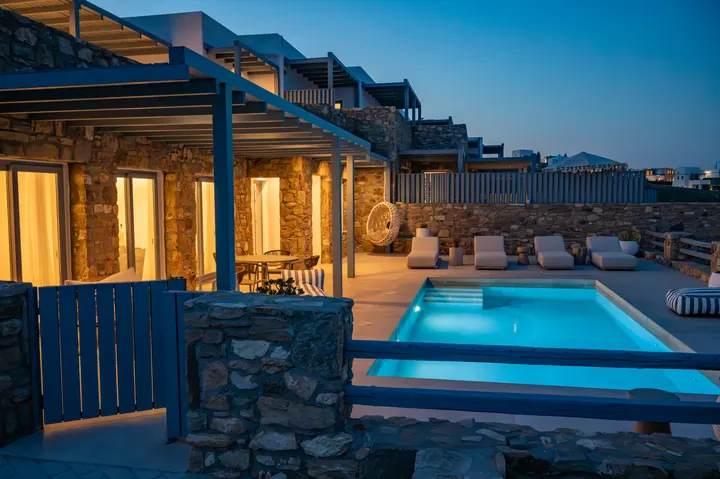 Private illuminated pool and chic stone terrace for relaxing evenings