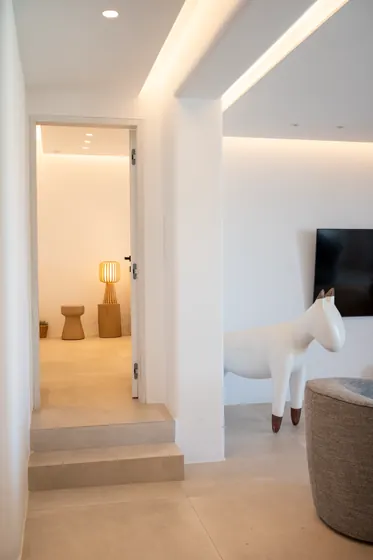 Bright minimalist interior with warm lighting and stylish designer touches