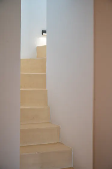 Minimalist stairway with modern lighting and sleek architectural style