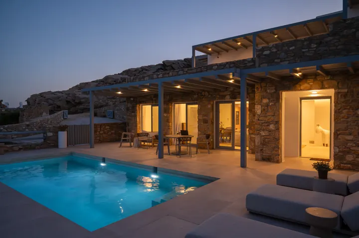 Private pool villa with stone charm and serene sunset ambiance