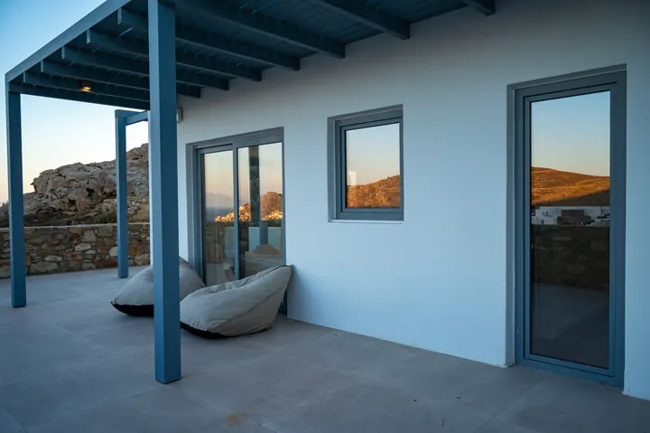 Shaded modern terrace with scenic mountain views and relaxing outdoor space
