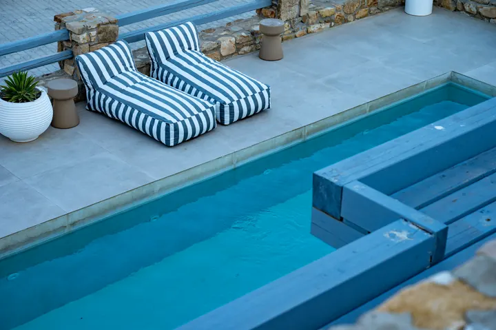 Private plunge pool with chic loungers and a stylish sun terrace